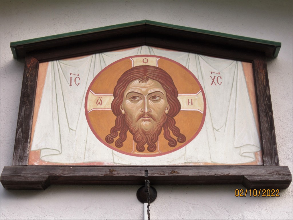 Старая Ладога. Церковь Алексия, человека Божия. архитектурные детали, Образ Спасителя над входом в церковь.