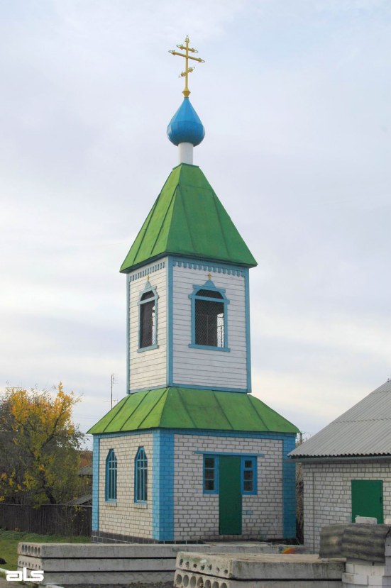 Церковь Покрова Пресвятой Богородицы, Берестовенька (Берестинский район, Украина, Харьковская область). архитектурные детали, Колокольня. Перестроена в 2005г.