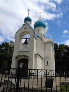Церковь Александра Невского, вид с угла на главный вход в храм и колокол над ним, Даугавпилс, Даугавпилс, город, Латвия