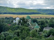 Церковь Троицы Живоначальной, На фоне Успенской церкви XV в., вид от Олеського замка<br>, Олесько, Бусский район, Украина, Львовская область