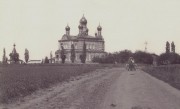 Церковь Сампсона Странноприимца, Сампсониевская церковь, справа виднеется крест над братской могилой русских воинов (1345 человек), сложивших головы в Полтавской битве.<br>, Полтава, Полтавский район, Украина, Полтавская область