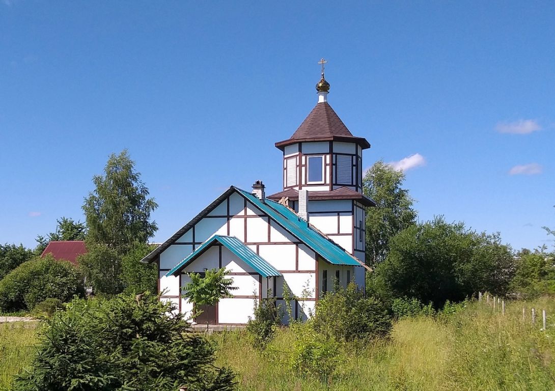 Церковь Покрова Пресвятой Богородицы, Торковичи (Лужский район, Ленинградская область). дополнительная информация, Дом священника с колокольней
(источник - Wikimedia Commons, CC-BY SA 4.0)