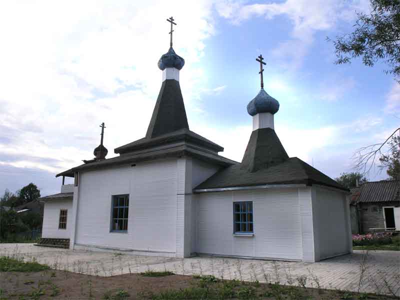 Церковь Тихона, Патриарха Всероссийского, Кунья (Куньинский район, Псковская область). общий вид в ландшафте