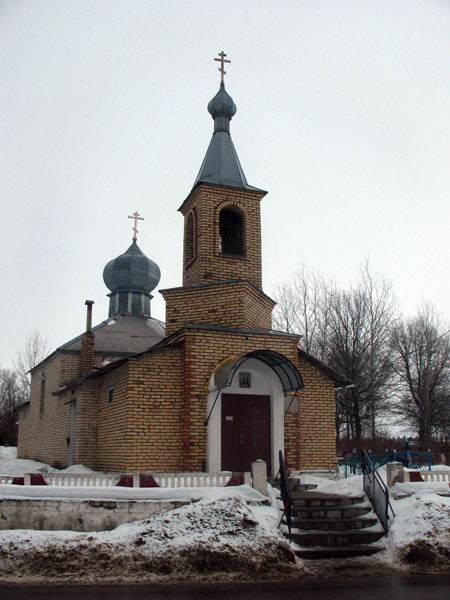 Церковь Космы и Дамиана, Драчково (Смолевичский район, Беларусь, Минская область). общий вид в ландшафте, Во 2-й половине ХХ в. церковь обложена кирпичем