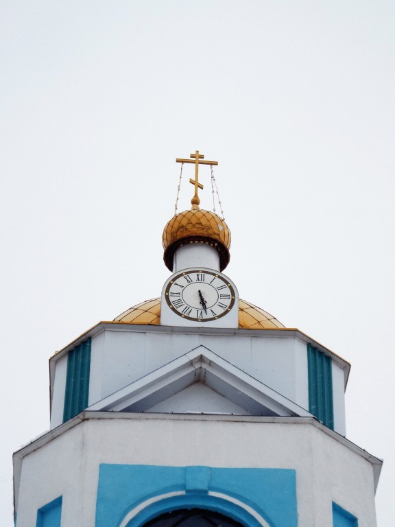 Собор Николая Чудотворца, Мензелинск (Мензелинский район, Республика Татарстан). архитектурные детали, Часы на верхнем ярусе колокольни.
