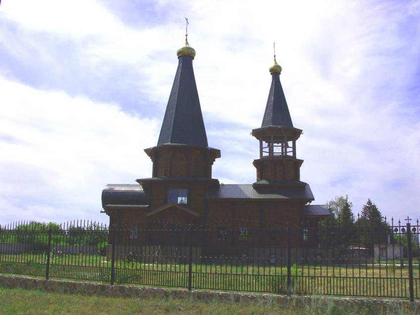 Церковь Покрова Пресвятой Богородицы (новая), Беседино (Курский район, Курская область). фасады, Деревянная церковь. Северный фасад.