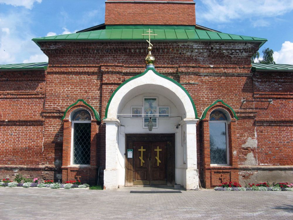 Алнаши. Церковь Троицы Живоначальной. архитектурные детали, Западный фасад храма с главными вратами