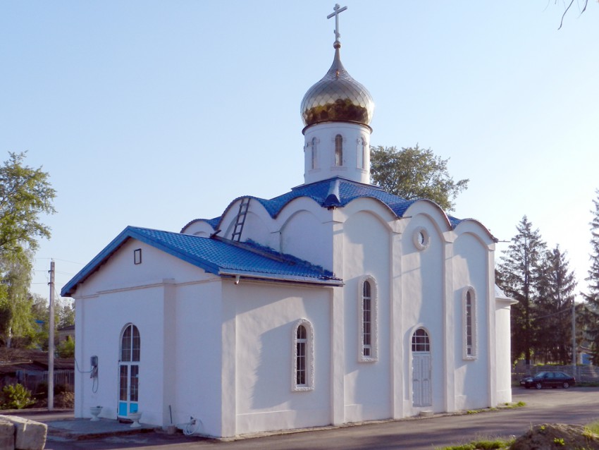 Хомутовка. Церковь Флора и Лавра. общий вид в ландшафте