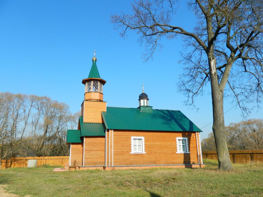 Беливо. Церковь Успения Пресвятой Богородицы. фасады, Успенская церковь построена в начале ХХ века; в 2010 г. надстроена звонницей и облицована тёсом.