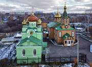 Церковь Иоанна Тобольского (крестильная), Восточный фасад. Справа Петропавловская церковь.<br>, Анжеро-Судженск, Анжеро-Судженск, город, Кемеровская область
