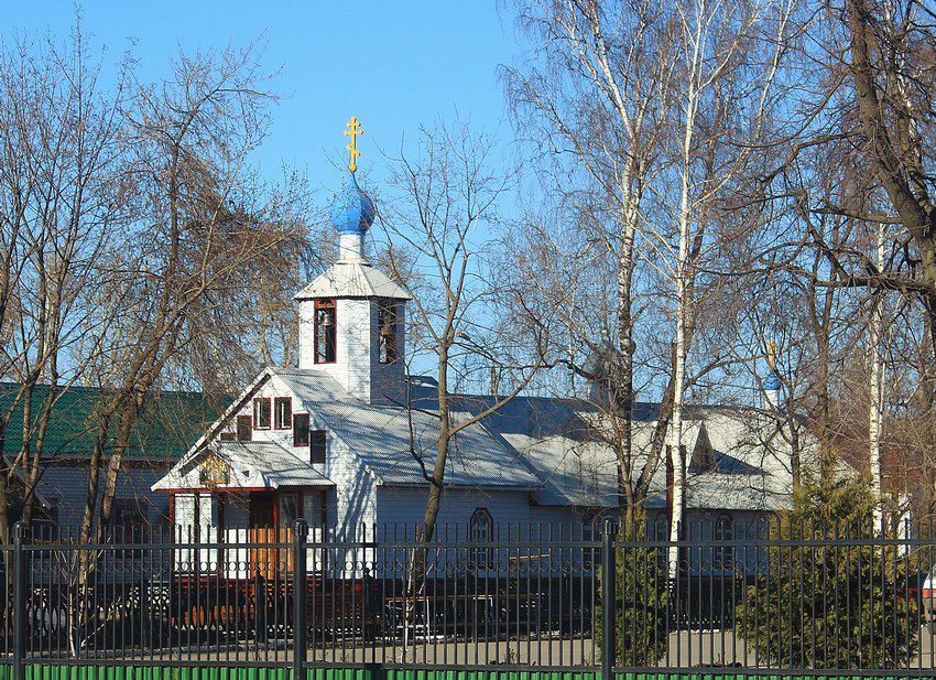 Церковь Казанской иконы Божией Матери, Димитровград (Димитровград, город, Ульяновская область). общий вид в ландшафте, Вид с противоположной стороны улицы Куйбышева