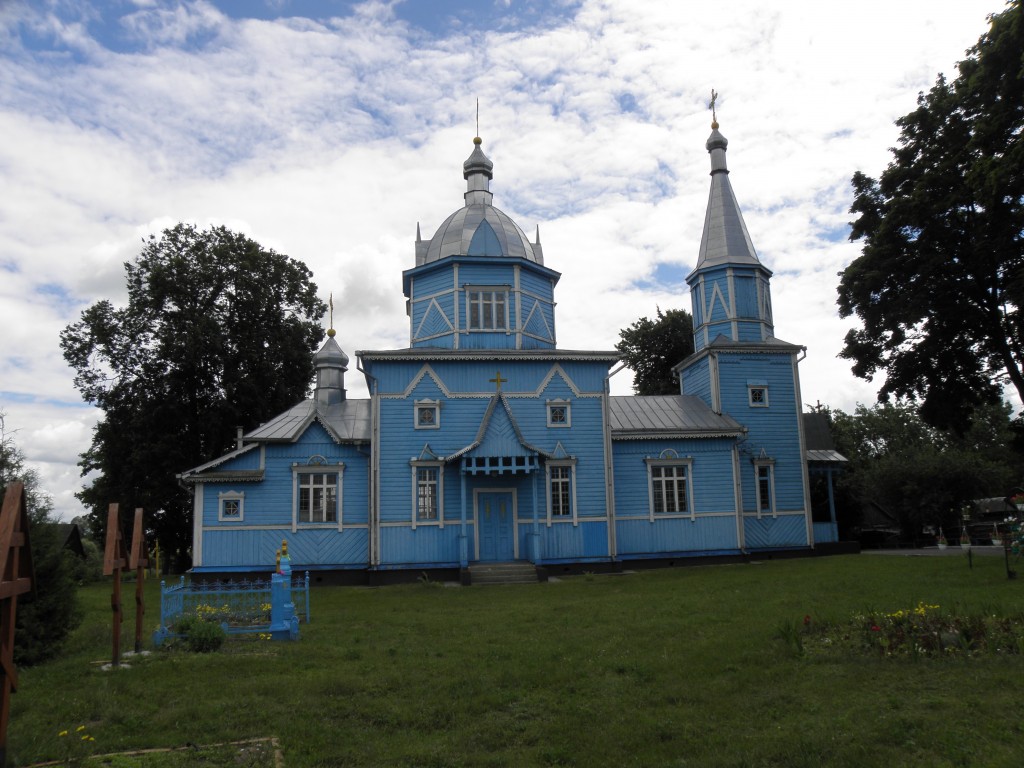 Белоуша. Церковь Троицы Живоначальной. фасады