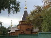 Церковь Михаила Архангела при психиатрической больнице, Вид с севера, со стороны улицы Ново-Вокзальной. Церковь находится за общим сплошным бетонным забором, ограничивающим территорию больницы<br>, Самара, Самара, город, Самарская область