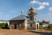 Церковь Благовещения Пресвятой Богородицы (новая), Справа виден остаток колокольни старой церкви<br>, Мухино, Зуевский район, Кировская область