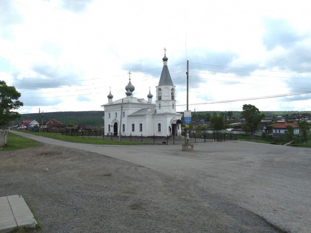 Айлино. Церковь Вознесения Господня. общий вид в ландшафте