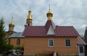 Церковь Николая Чудотворца, Вид с севера. За церковью Николая Чудотворца видна Казанская церковь, далее Воскресенский храм<br>, Нижнекамск, Нижнекамский район, Республика Татарстан