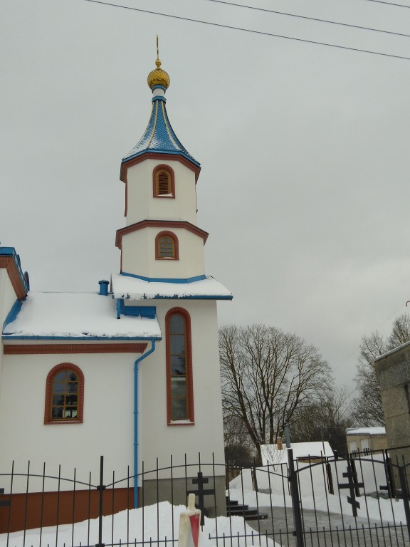Иецава. Церковь Рождества Пресвятой Богородицы. архитектурные детали, Вид на колокольню с левой стороны