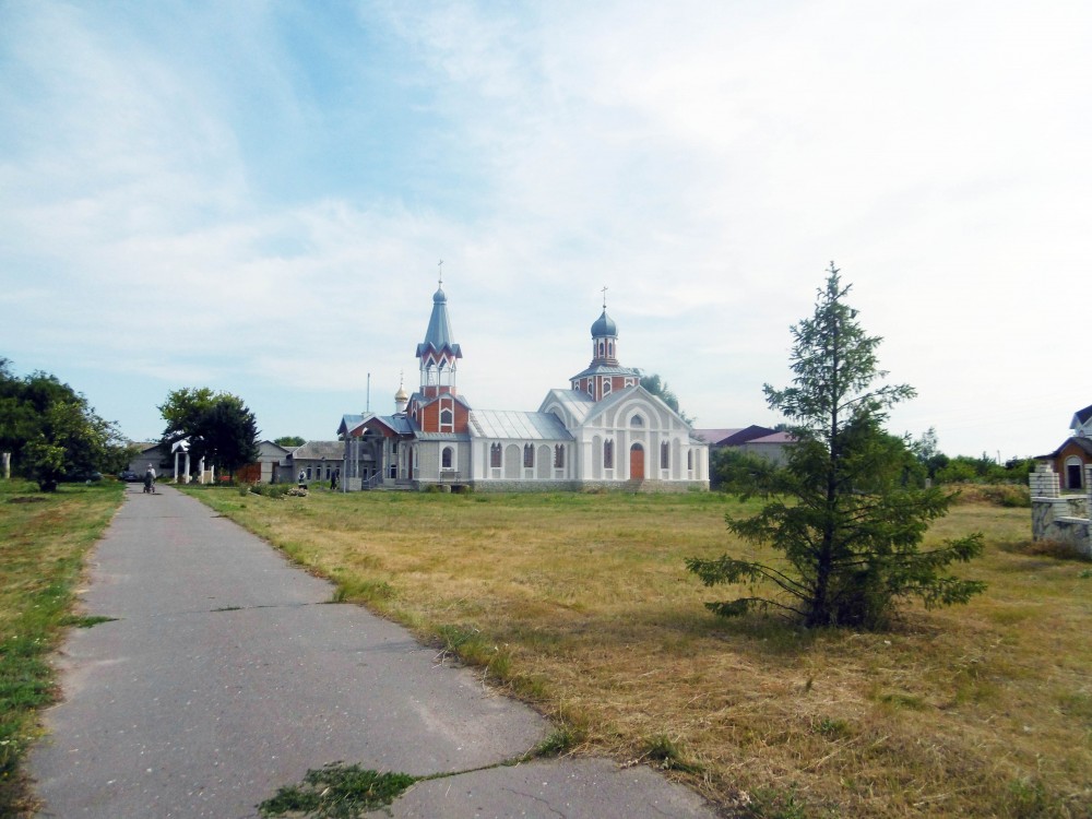 Церковь Михаила Архангела, Алексиковский (Новониколаевский район, Волгоградская область). общий вид в ландшафте, Вид церкви при въезде в хутор