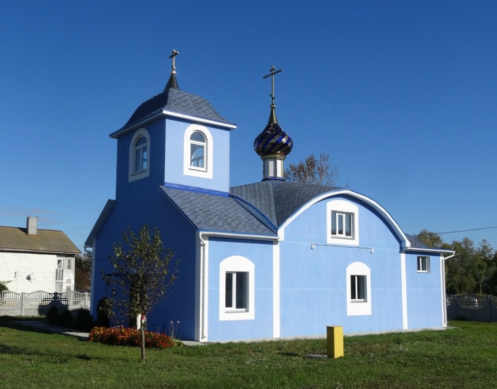 Жгунь. Церковь Успения Пресвятой Богородицы. фасады