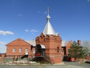 Церковь Спаса Преображения, Иконная лавка на фоне церковной школы.<br>, Орск, Орск, город, Оренбургская область