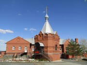 Церковь Преображения Господня, Иконная лавка на фоне церковной школы.<br>, Орск, Орск, город, Оренбургская область
