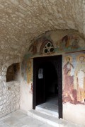 Монастырь Неофита Затворника. Пещерная церковь Честного Креста, фрески у входа в пещерную церковь<br>, Тала, Пафос, Кипр