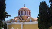 Церковь Благовещения Пресвятой Богородицы, Крест на куполе. Вид со стороны алтаря<br>, Сими (Σύμη), Южные Эгейские острова (Περιφέρεια Νοτίου Αιγαίου), Греция