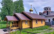 Калининский район. Воскресения Христова у Пискарёвского кладбища (временная), церковь