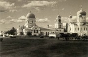 Церковь Спаса Нерукотворного Образа, Фото 1900-х годов с сайта http://my.mail.ru/mail/romanovep/photo/70 Церковь слева.<br>, Богучар, Богучарский район, Воронежская область