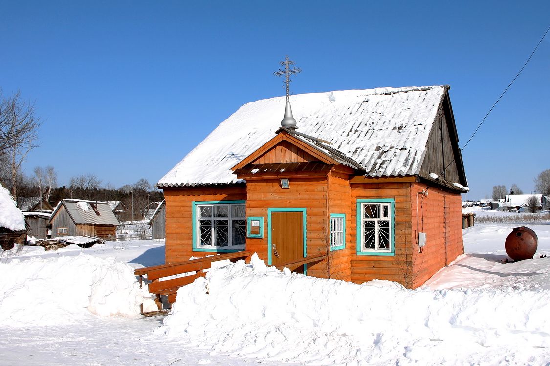 Святица. Молельный дом Успения Пресвятой Богородицы. фасады