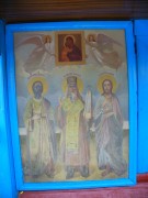 Часовня Преображения Господня и Климента, папы Римского, Образ Свв. Козьмы, Дамиана и Климента -- папы Римского у входа в часовню<br>, Заслуховье, Лужский район, Ленинградская область