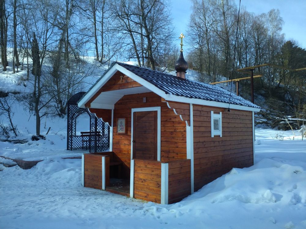 Глубоково (погост Иванова Гора). Неизвестная часовня. фасады, Деревянная часовня над купелью