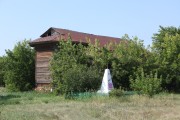 Церковь Казанской иконы Божией Матери, Общий вид (бывшая церковь сильно заросла деревьями)<br>, Таволжанка, Куртамышский район, Курганская область