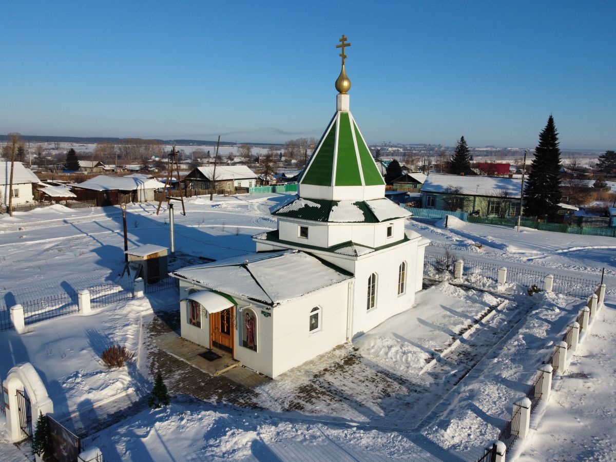 Церковь Державной иконы Божией Матери, Родники (Шарыповский район и г. Шарыпово, Красноярский край). общий вид в ландшафте, Вид с ЮЗ