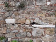Церковь иконы Божией Матери "Всецарица", мраморная колонна от более раннего сооружения, использованная в кладке. Южная стена<br>, Трилья, Бурса, Турция