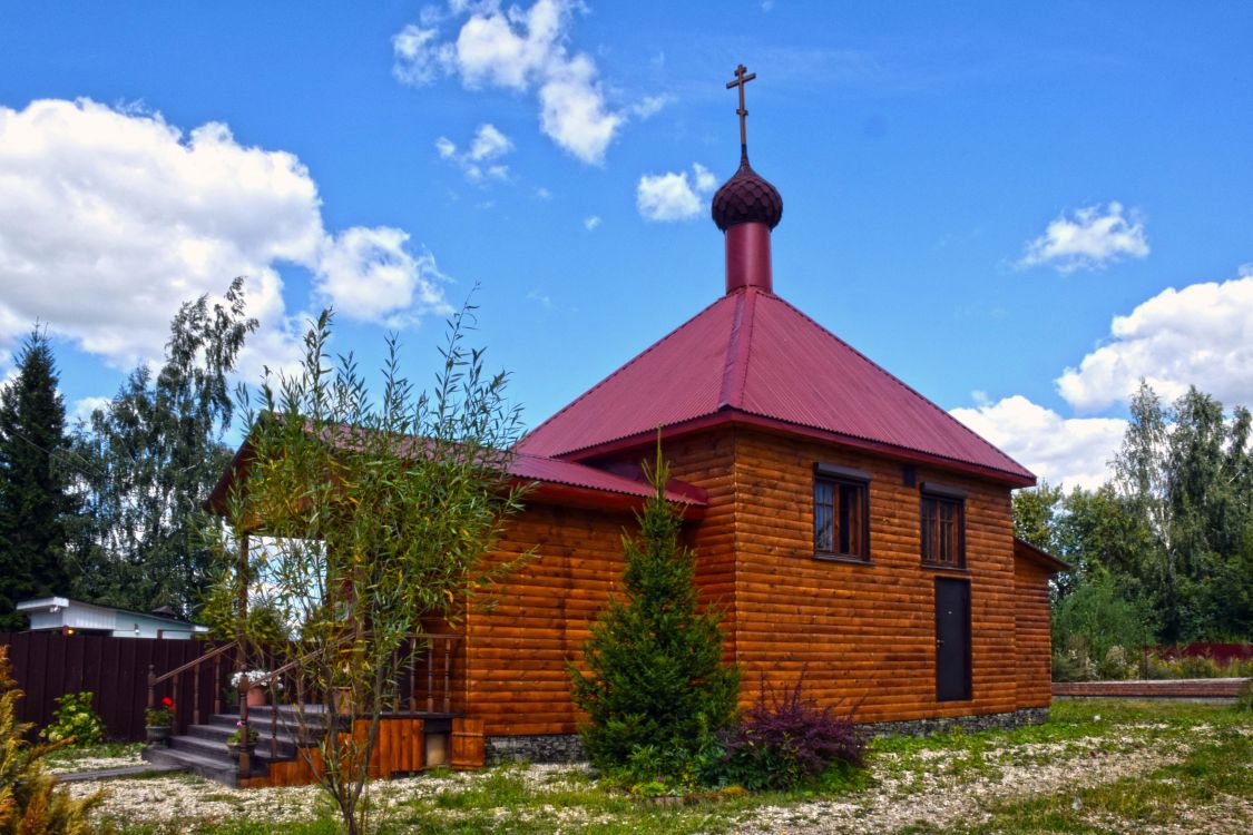 Домодедово. Церковь Тихвинской иконы Божией Матери (деревянная). фасады, Временный храм