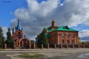 Церковь Николая Чудотворца, слева - Тихвинская церковь<br>, Муромцево, Муромцевский район, Омская область
