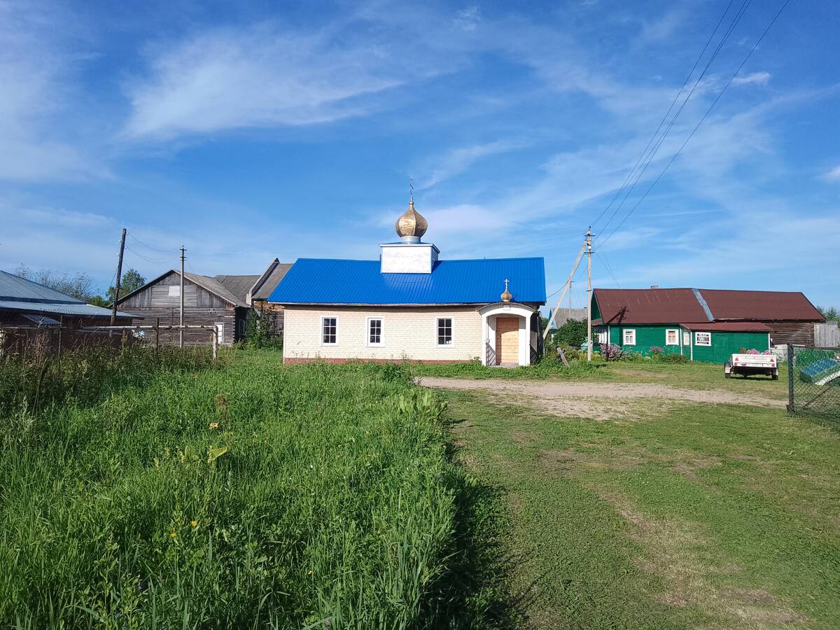 Часовня Успения Пресвятой Богородицы, Пигилинская (Сямженский район, Вологодская область). общий вид в ландшафте