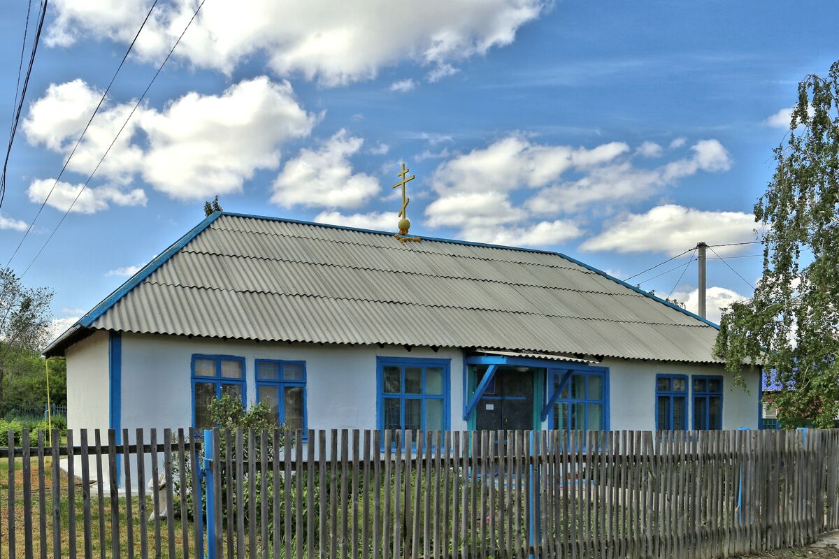 Церковь Иоанна Богослова, Славянка (Нововаршавский район, Омская область). общий вид в ландшафте